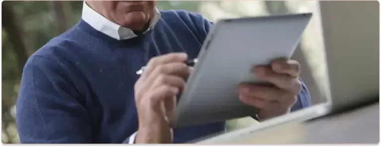 Picture of a man with an iPad