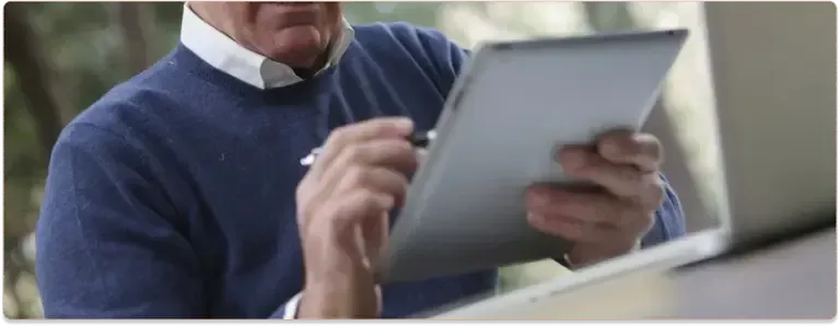 Man holding an Ipad