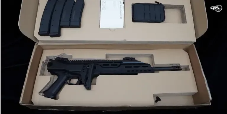 Picture of a CZ Scorpion in a box with 4 magazines