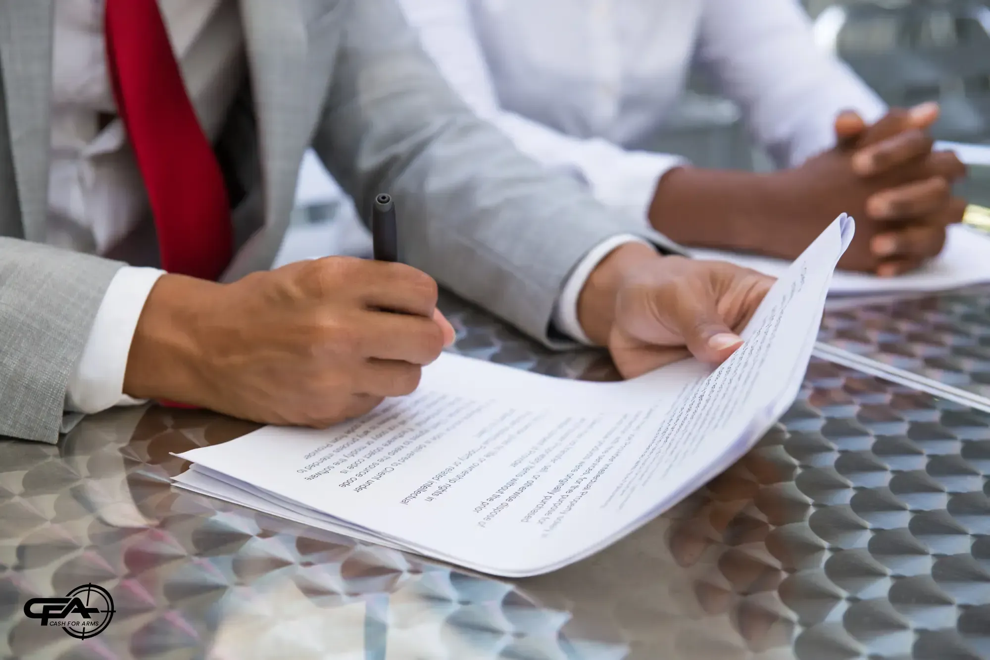 Picture representing law,two people signing documents
