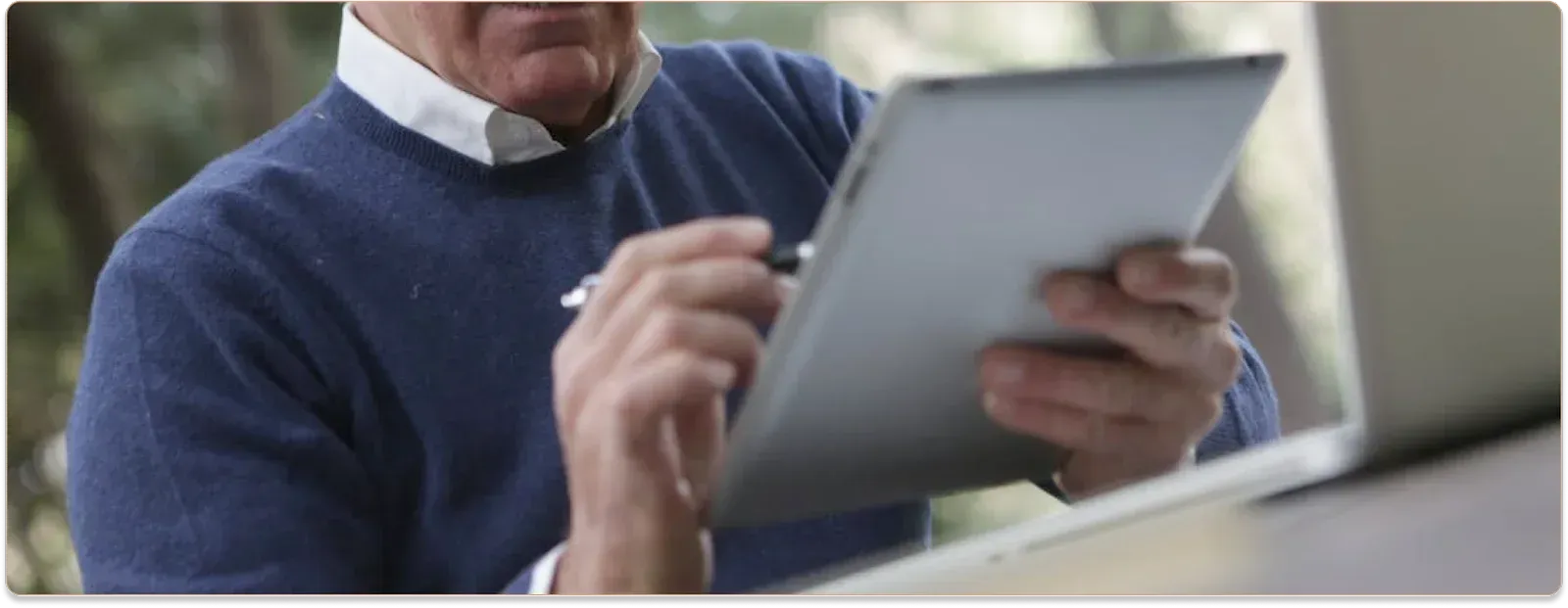 Man holding an iPad