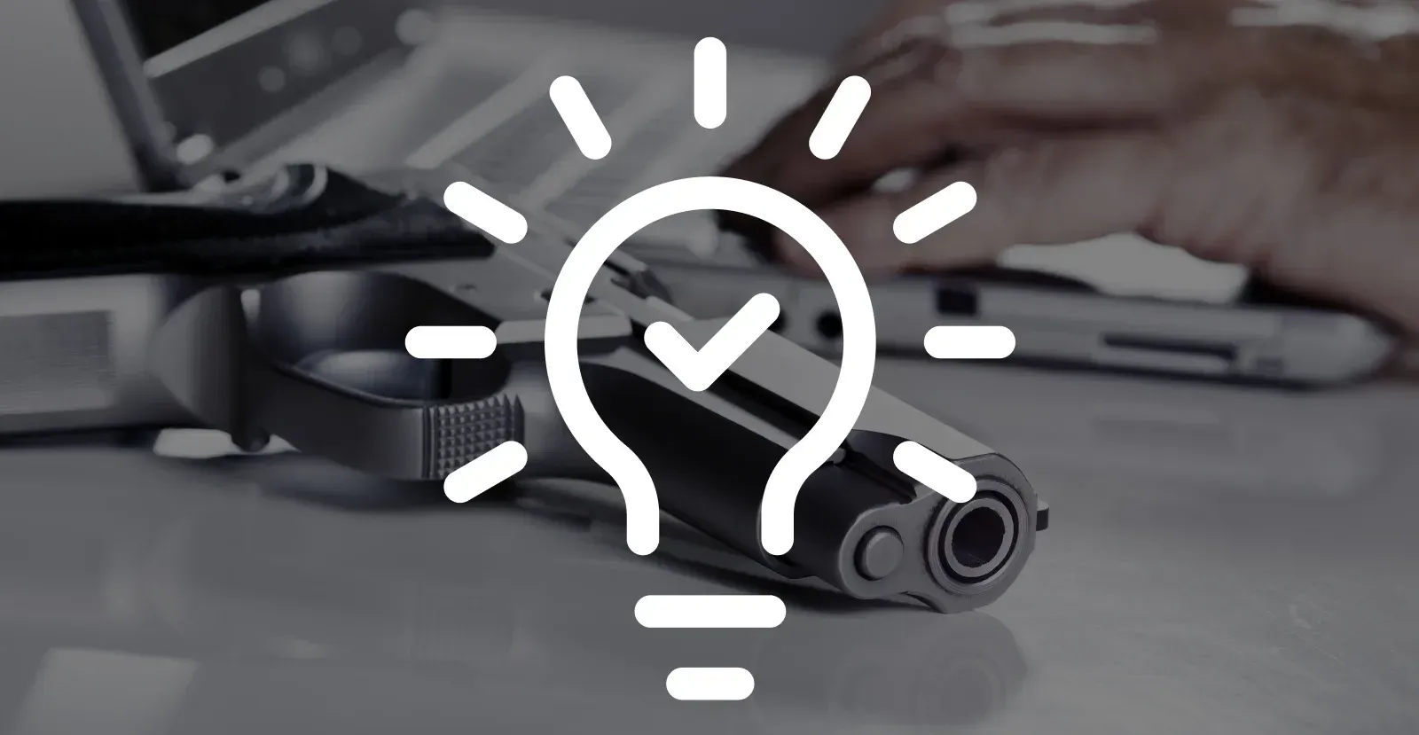 Gun laying on table with lightbulb symbol in front