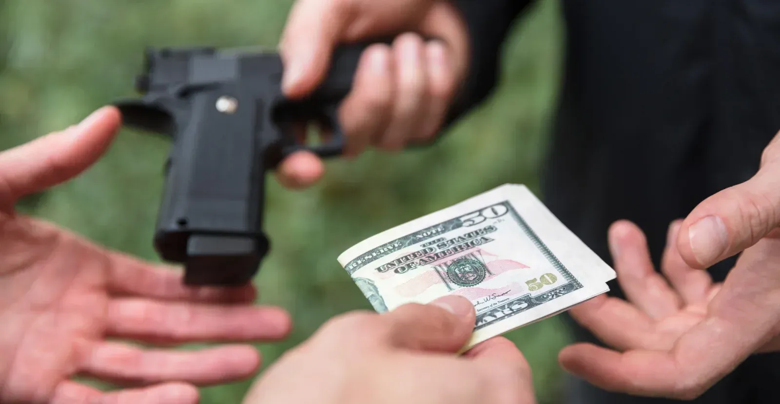 Person buying a gun with cash
