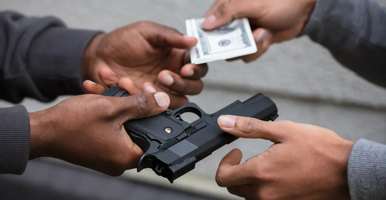 Person buying a gun with cash