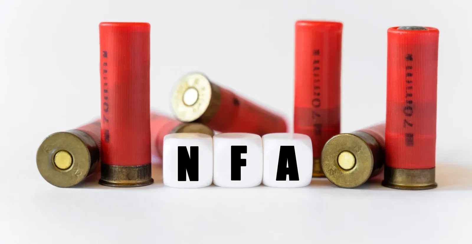 70mm ammo rounds with blocks spelling NFA
