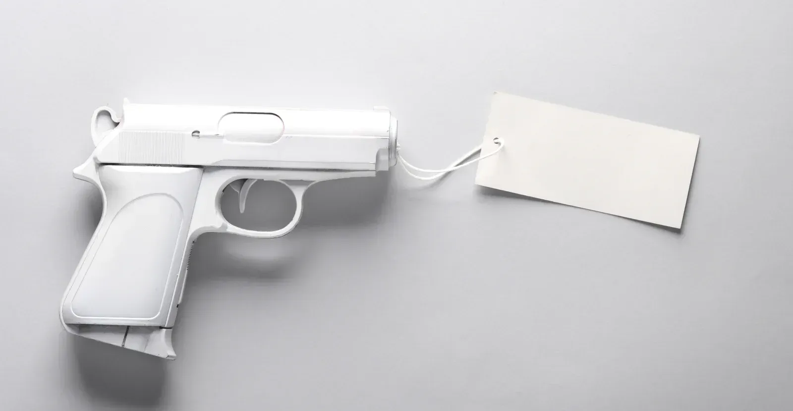 Blank gun with tag