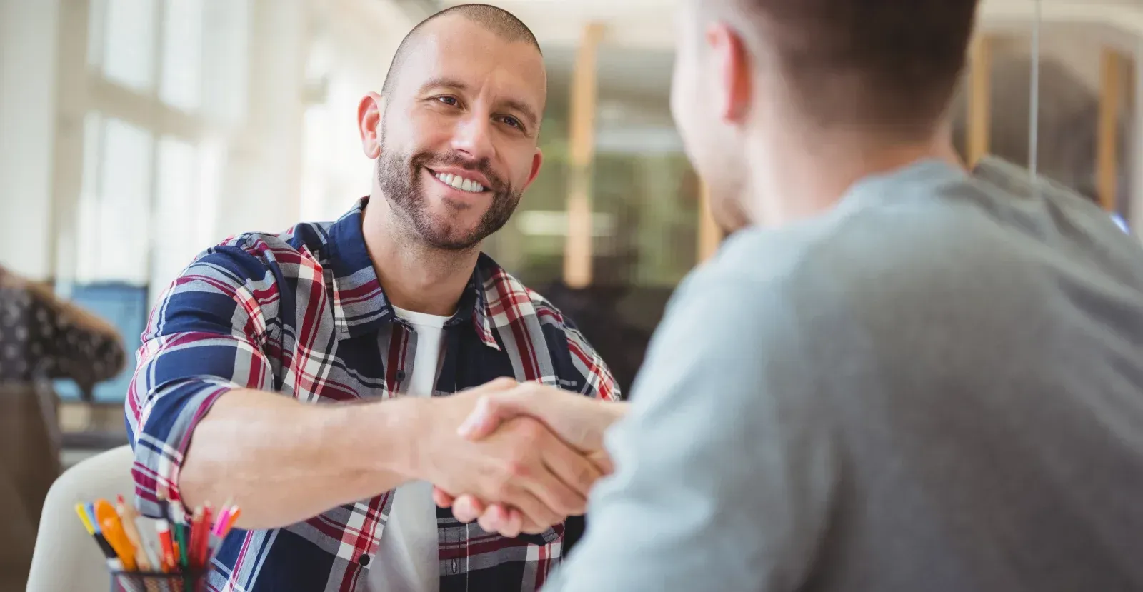 Two people shaking hands
