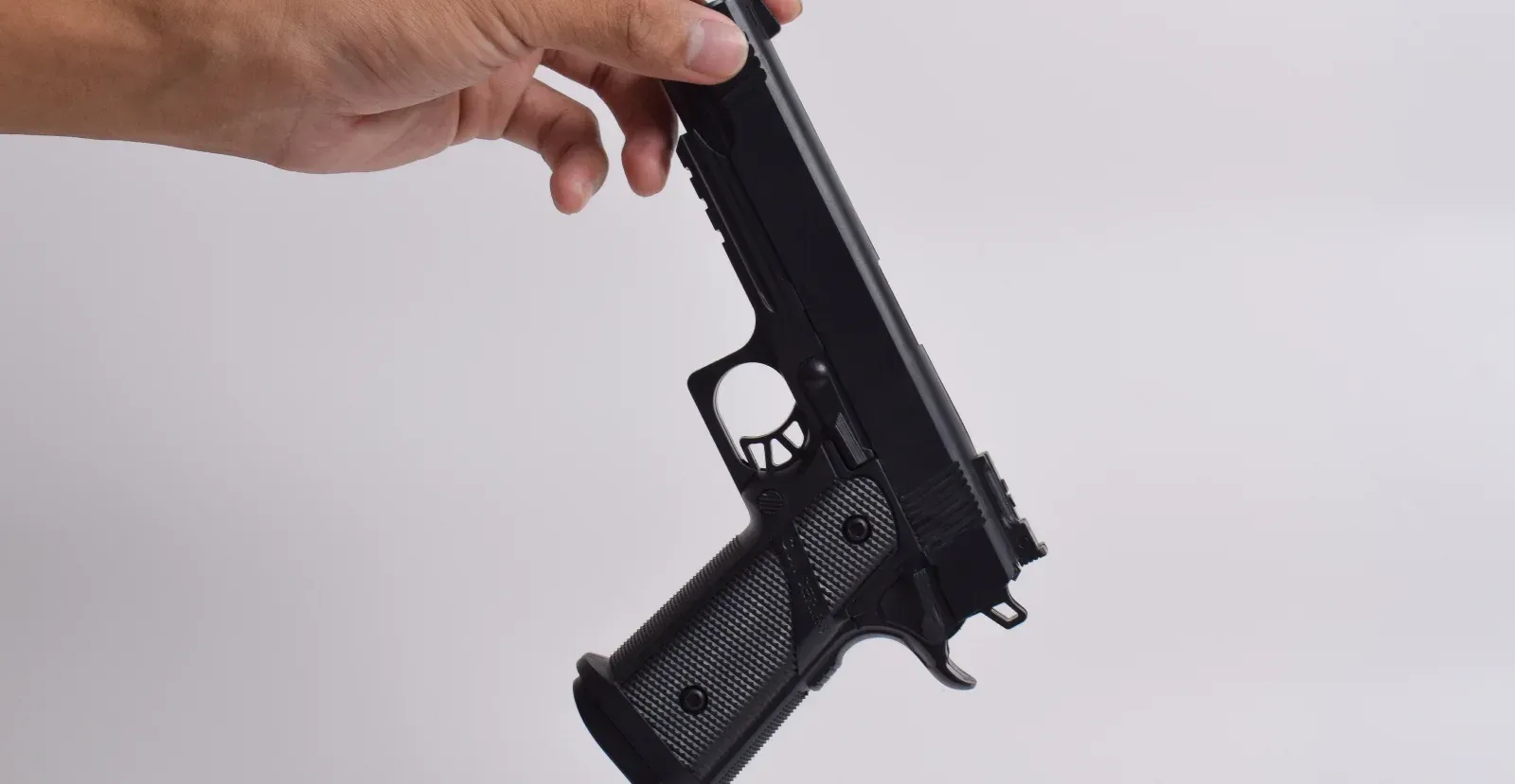 Person holding a gun