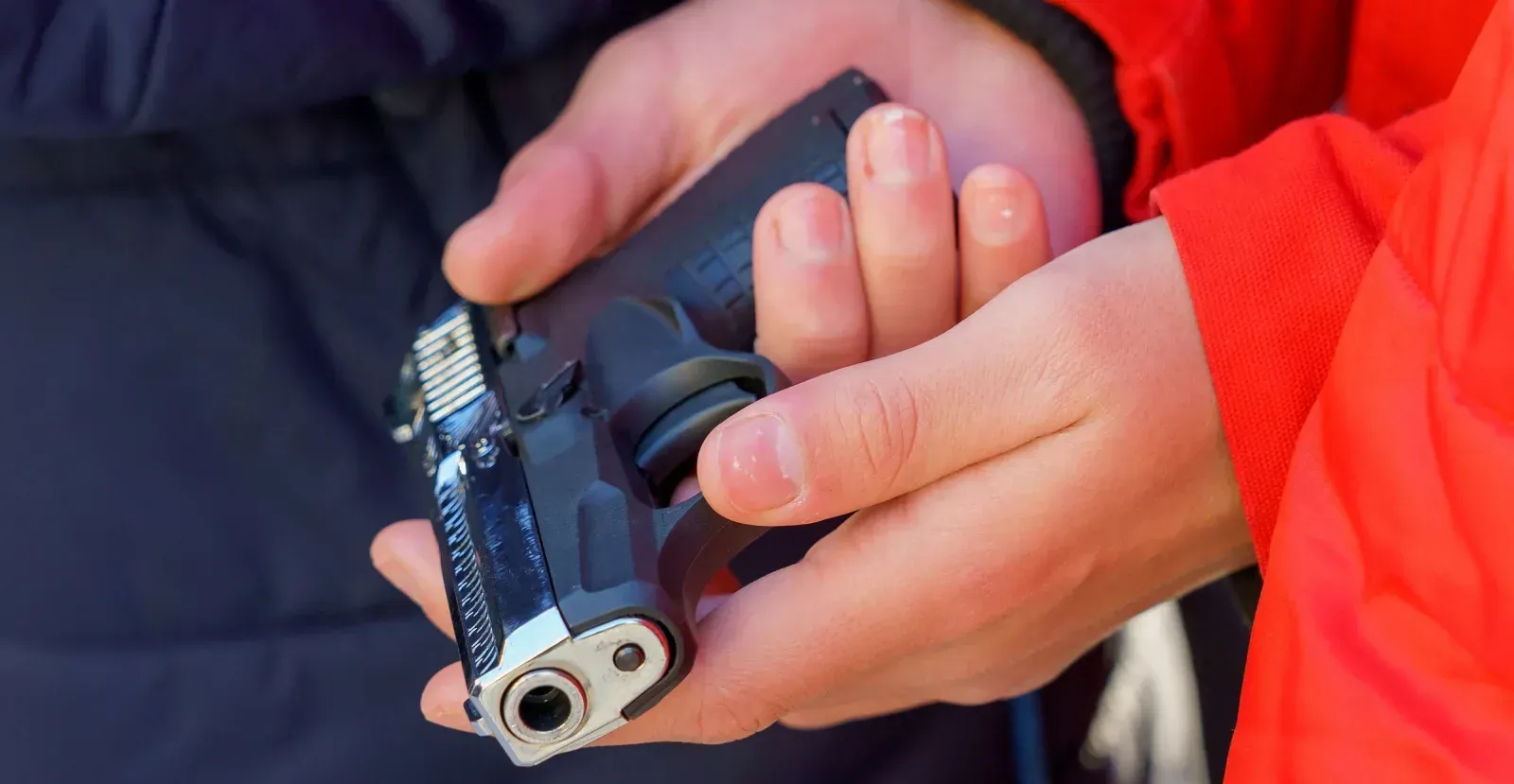 Person holding a gun