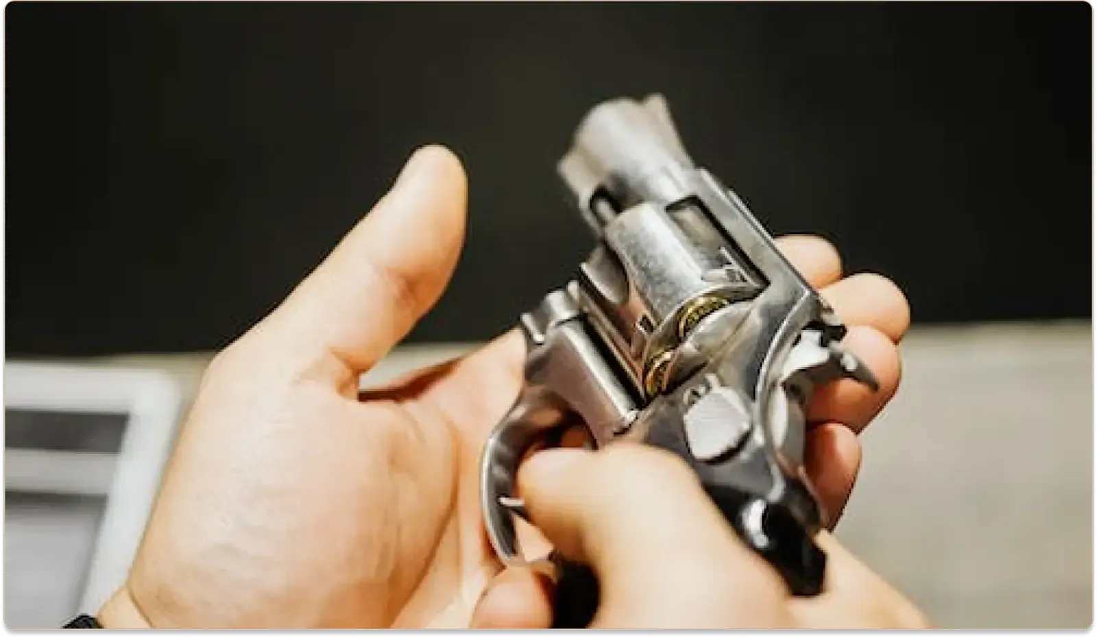 Person holding a handgun