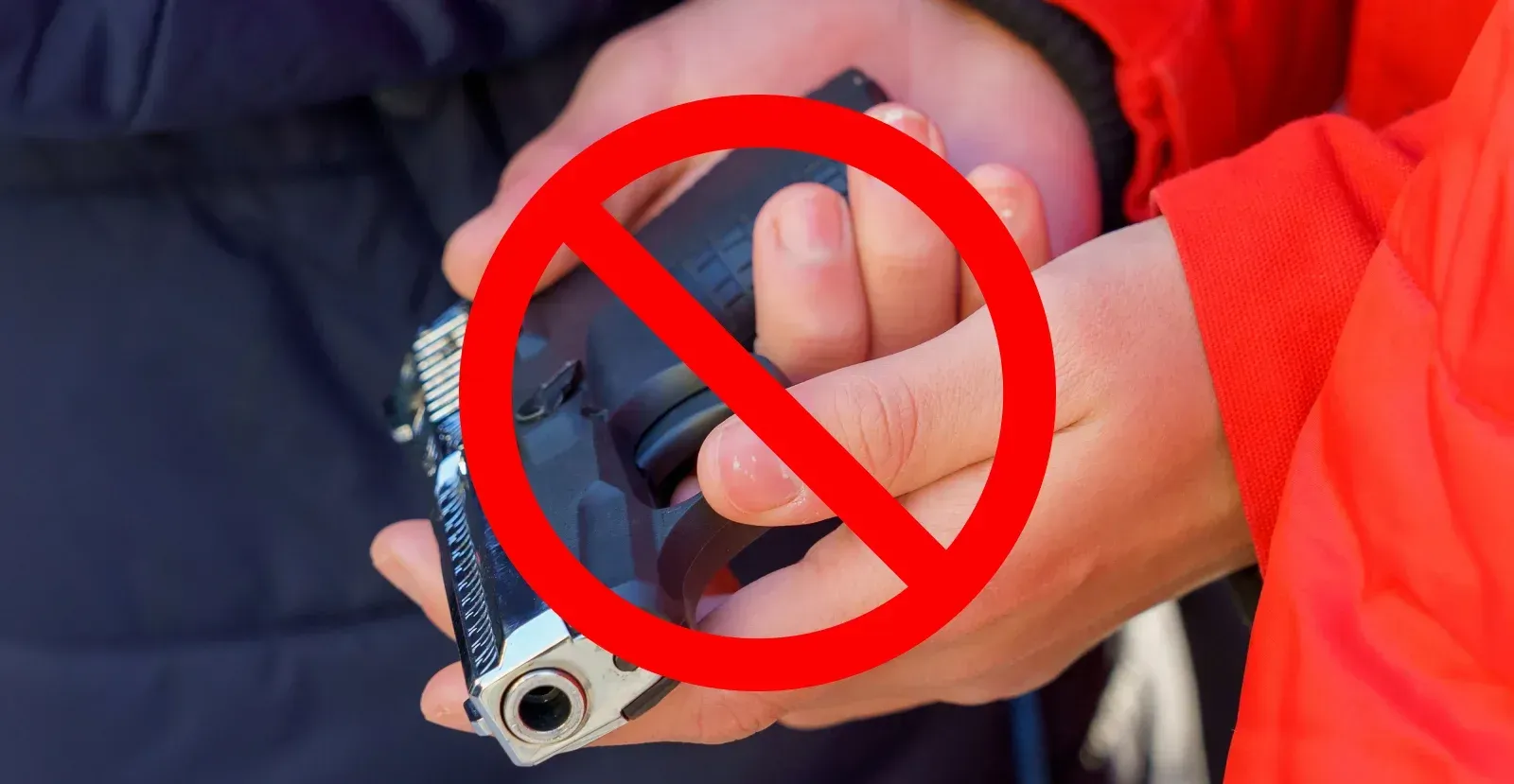 Person holding a gun with a cancel symbol on top