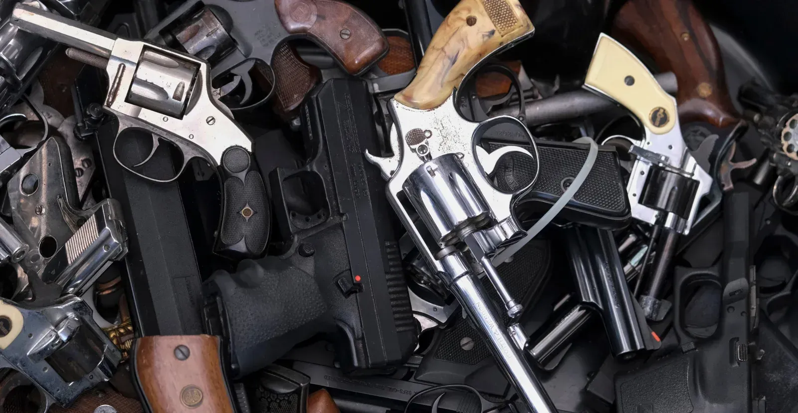 Pile of various handguns