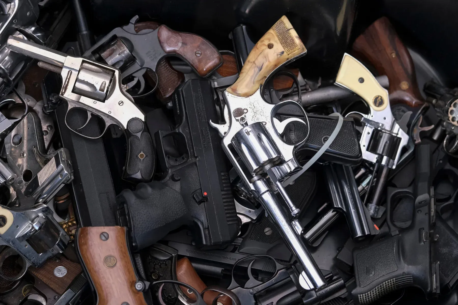 Pile of various guns