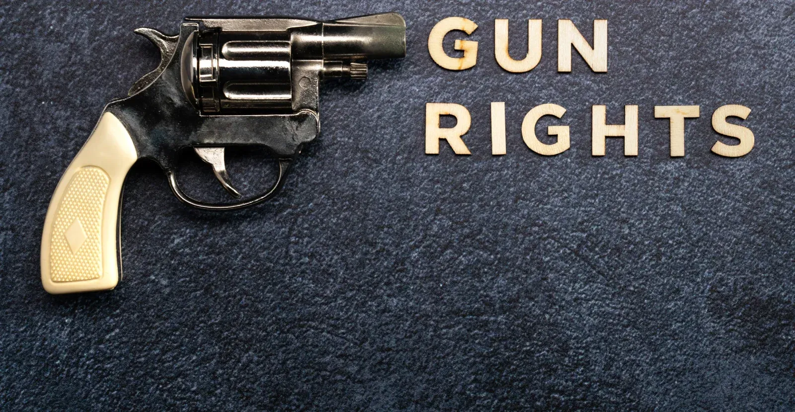 Guns Rights next to revolver