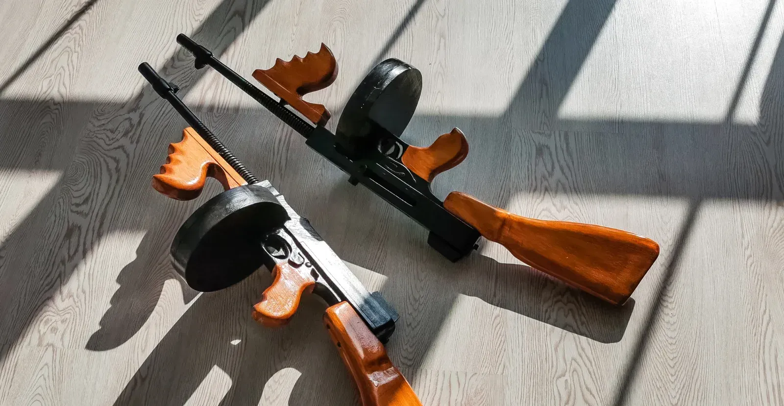 Two thompson submachine guns