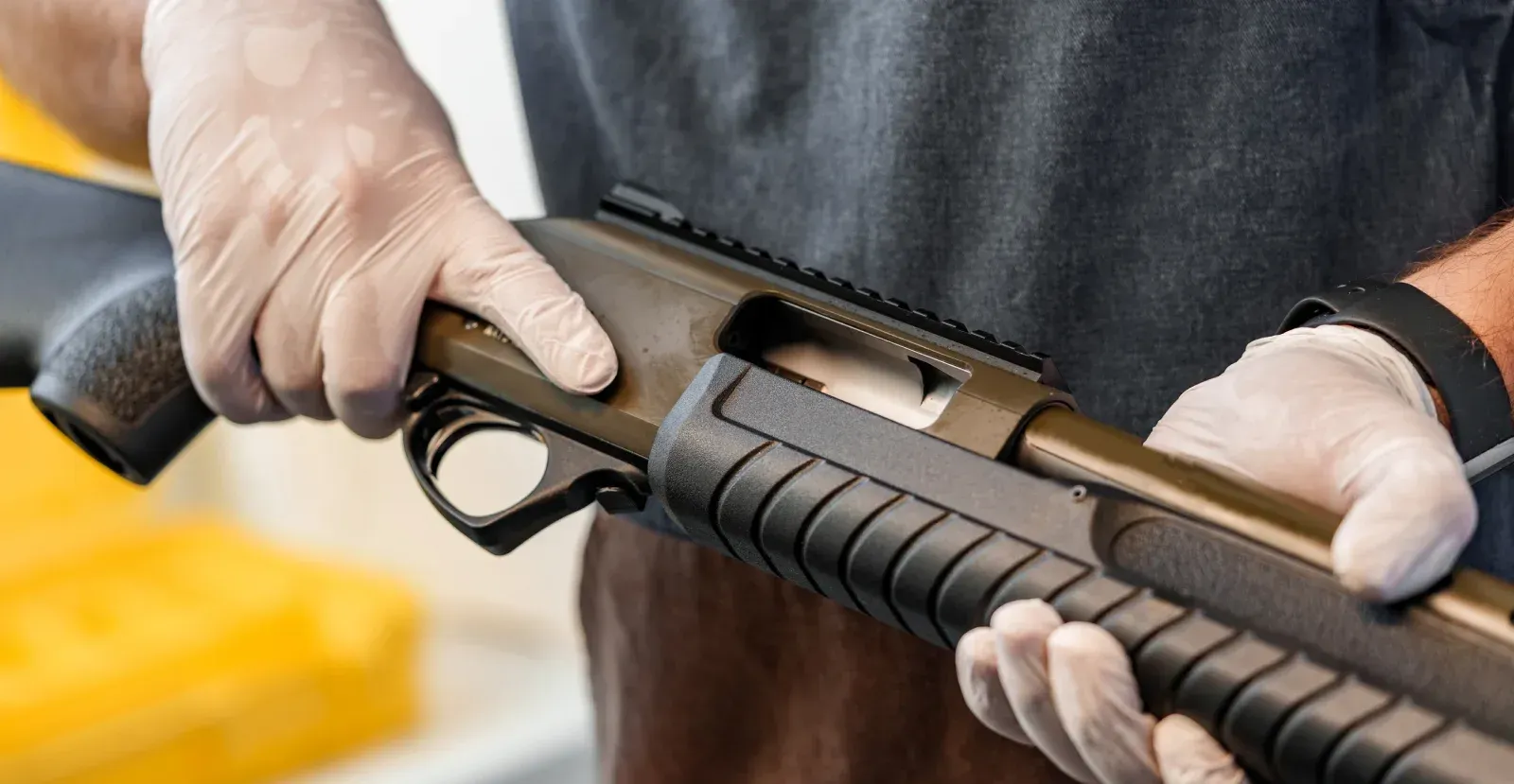 Man holding a shotgun