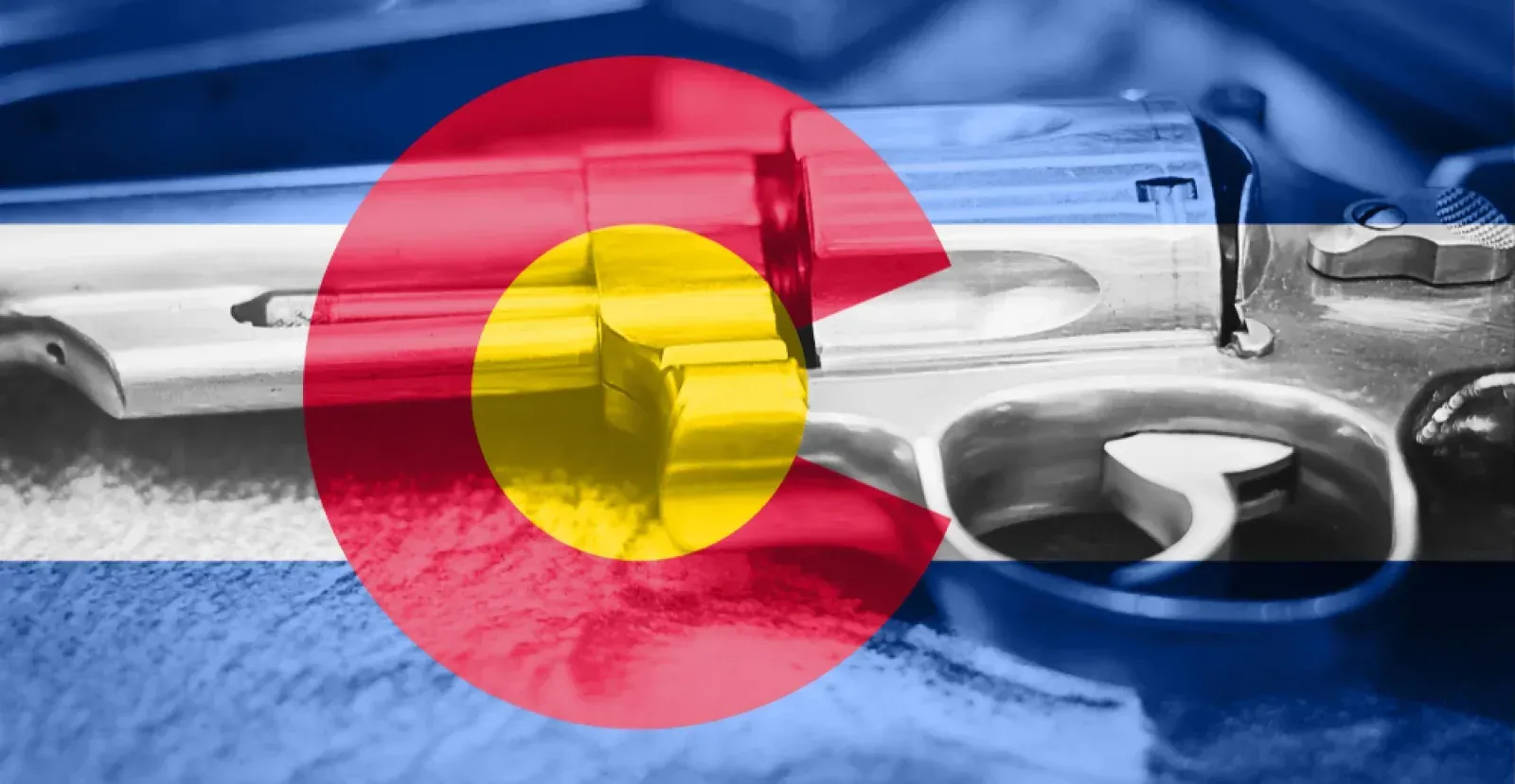 Colorado flag on top of a revolver