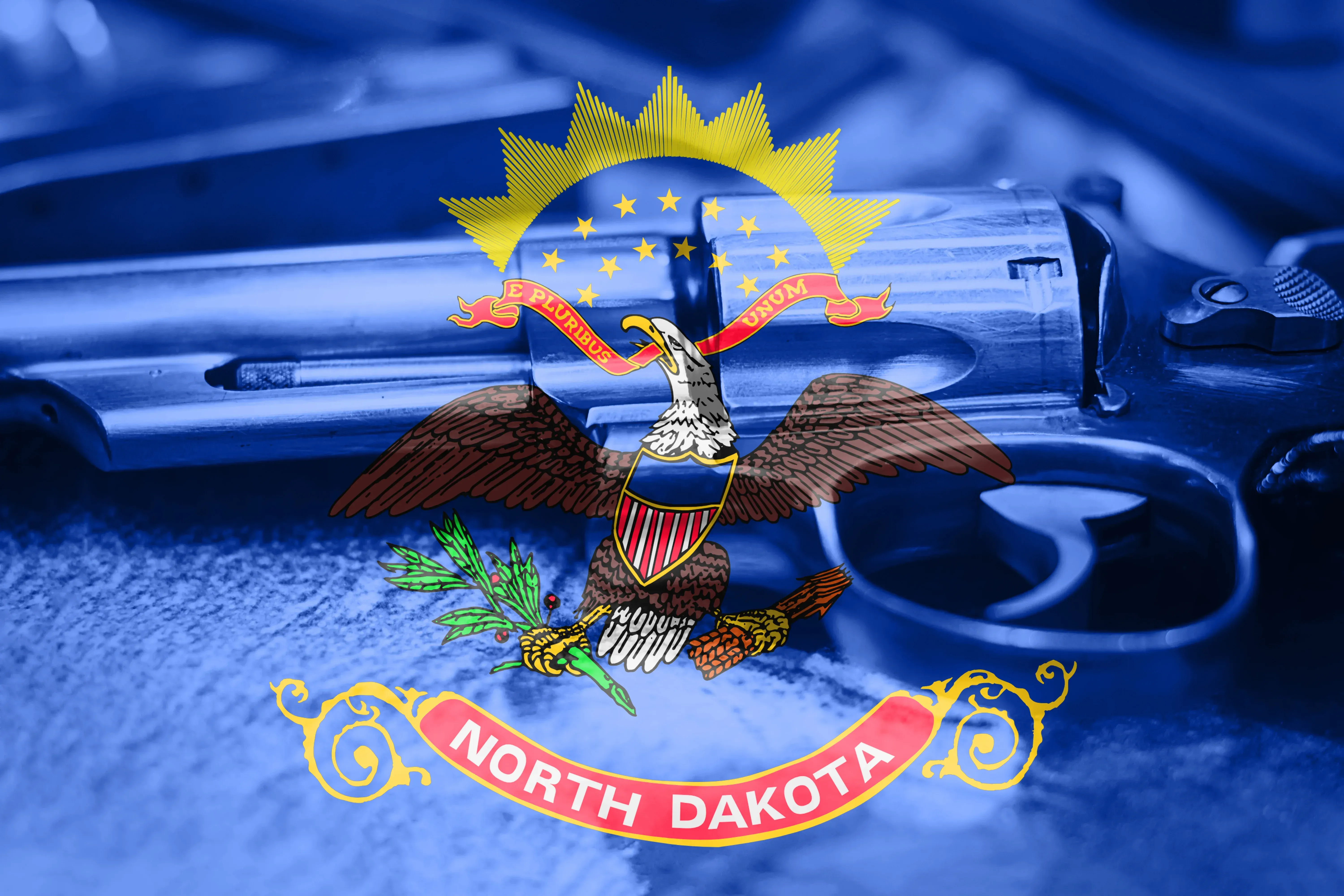 North Dakota flag on top of a revolver