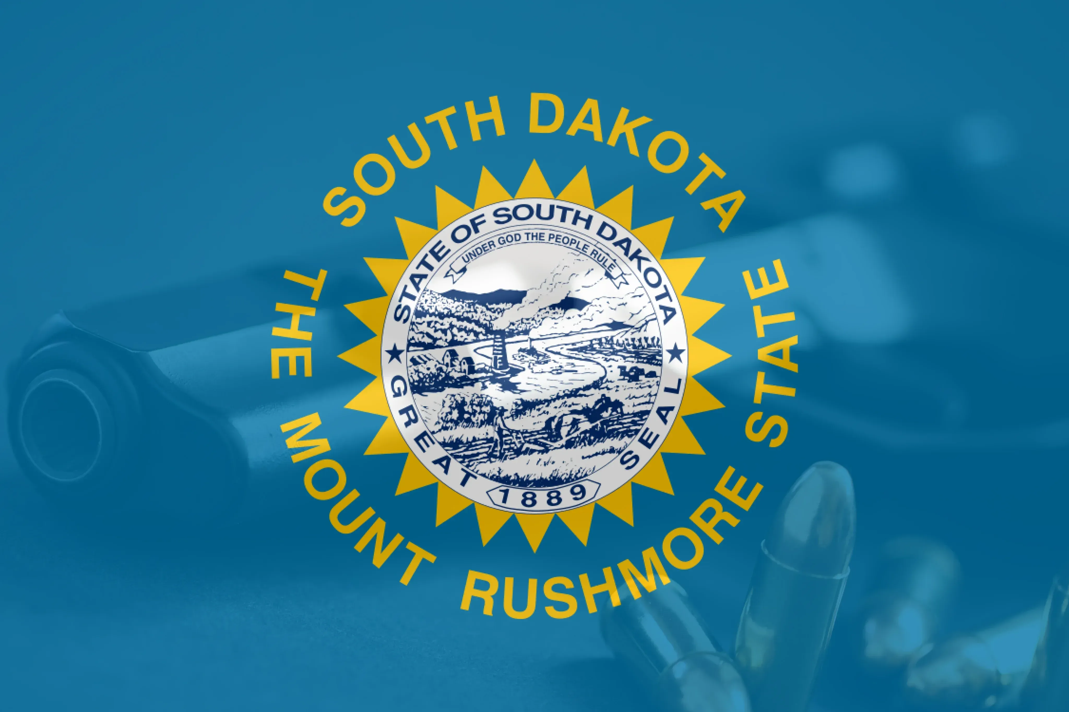 South Dakota flag on top of a revolver