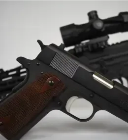1911 and a sniper rifle