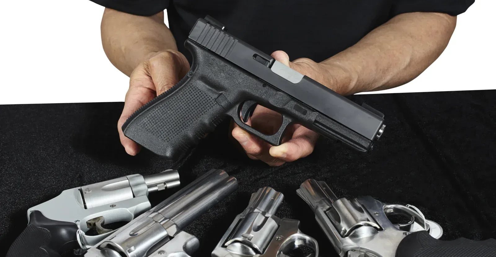 A person presenting a pistol