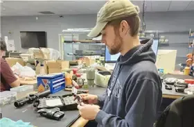 Cash for Arms facility