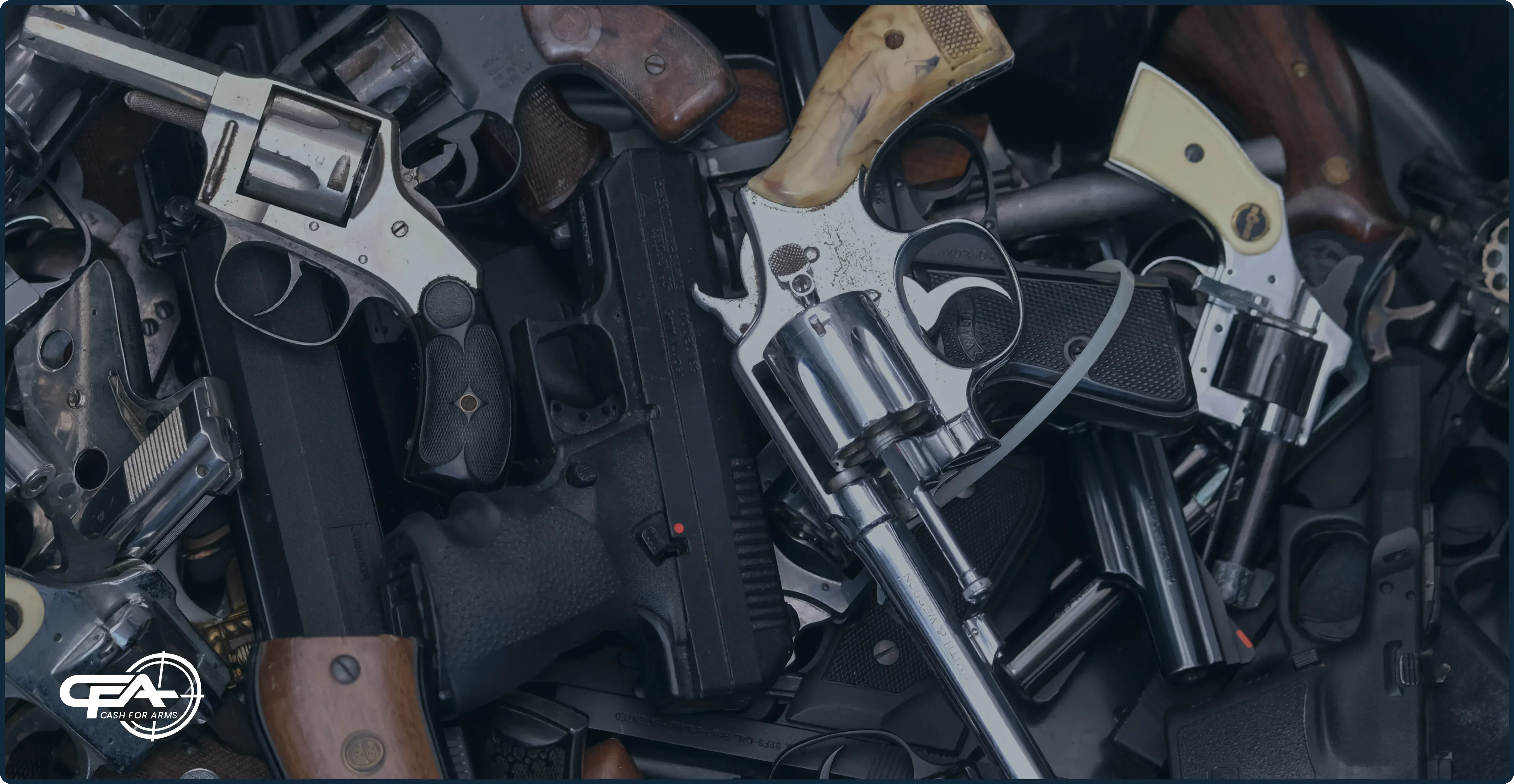 pile of handguns