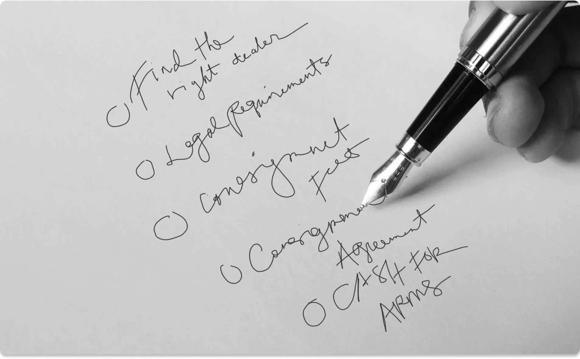 Pen writing a checklist on a piece of paper