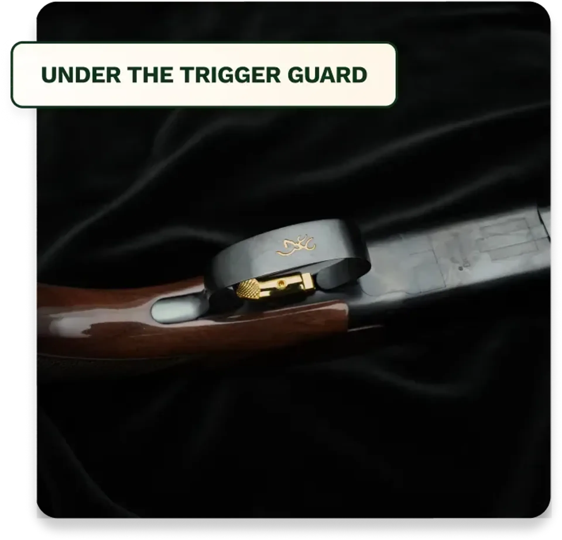 Markings under the trigger guard of a shotgun