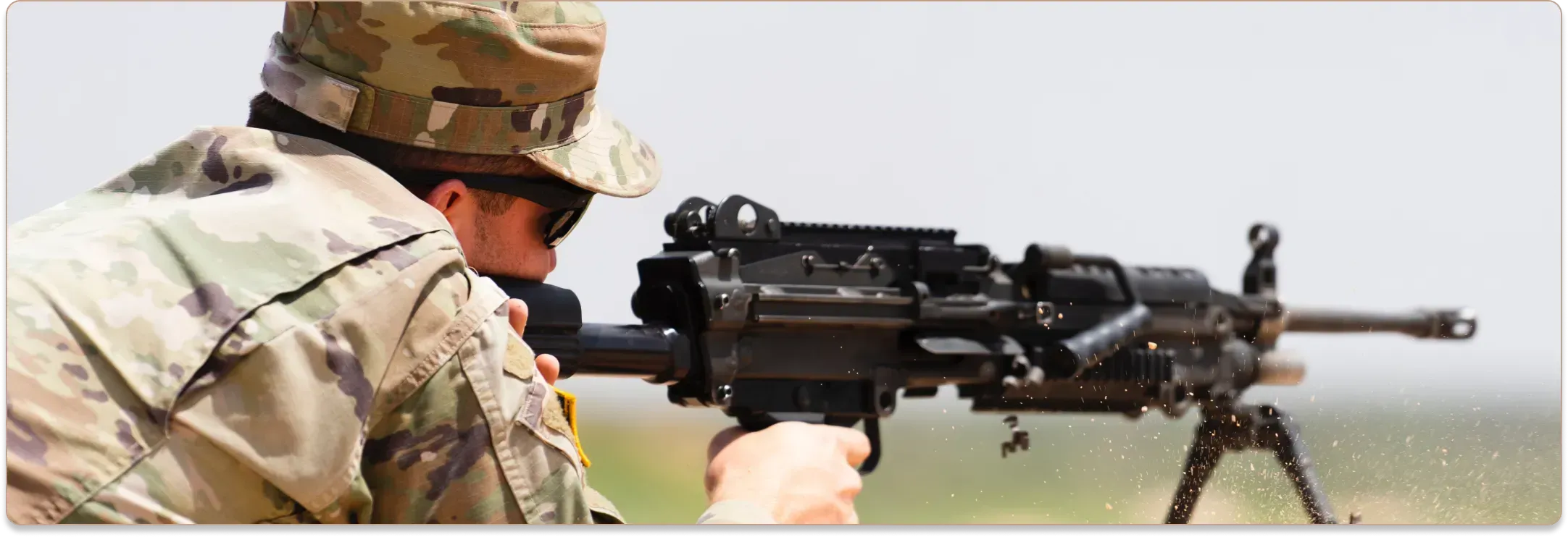 Soldier firing an automatic gun